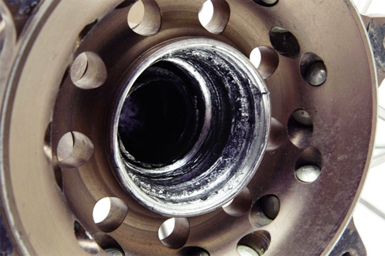 If the rear wheel bearings on your bicycle are loose, you'll need to grease them.