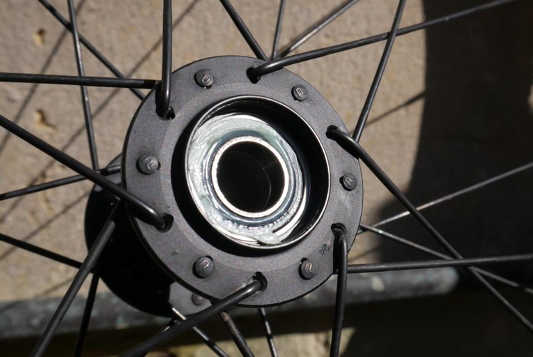 If your bicycle's rear wheel bearings are loose, you'll need to remove the hub and clean it.