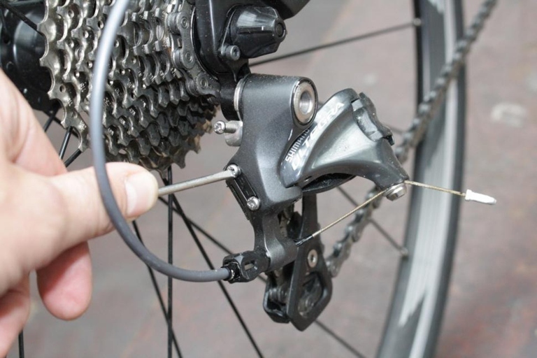 If your new bike chain is slipping, it could be because the rear derailleur isn't properly adjusted.
