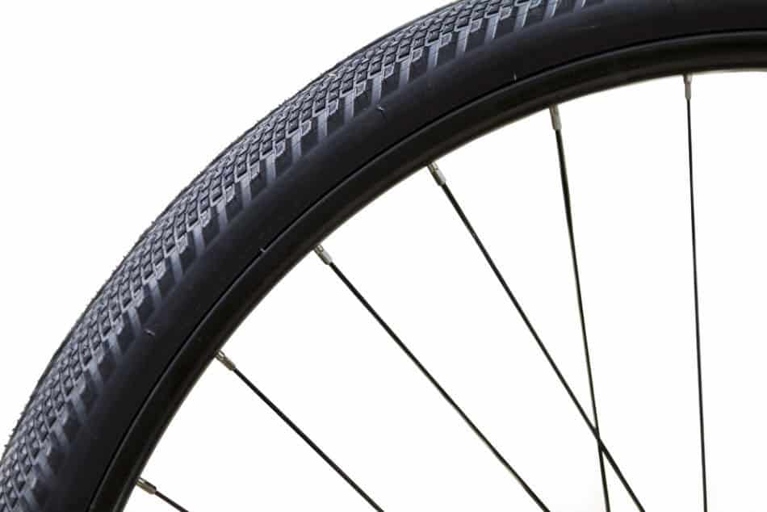If you're looking to convert your road bike into a hybrid, one of the best ways to do so is by changing your tires for thicker, sturdier ones.