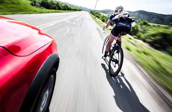 One of the biggest dangers while riding a bike is becoming distracted and not paying attention to the road.