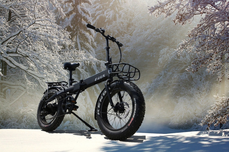 When riding an e-bike in the winter, it is important to dress appropriately to stay warm and dry.